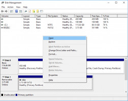 Open unreadable flash drive through Disk Management.